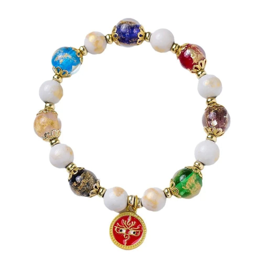 Handmade coloured glaze glass bracelet with Five Gods of Wealth geometric design in blue, green, red, white, or yellow.