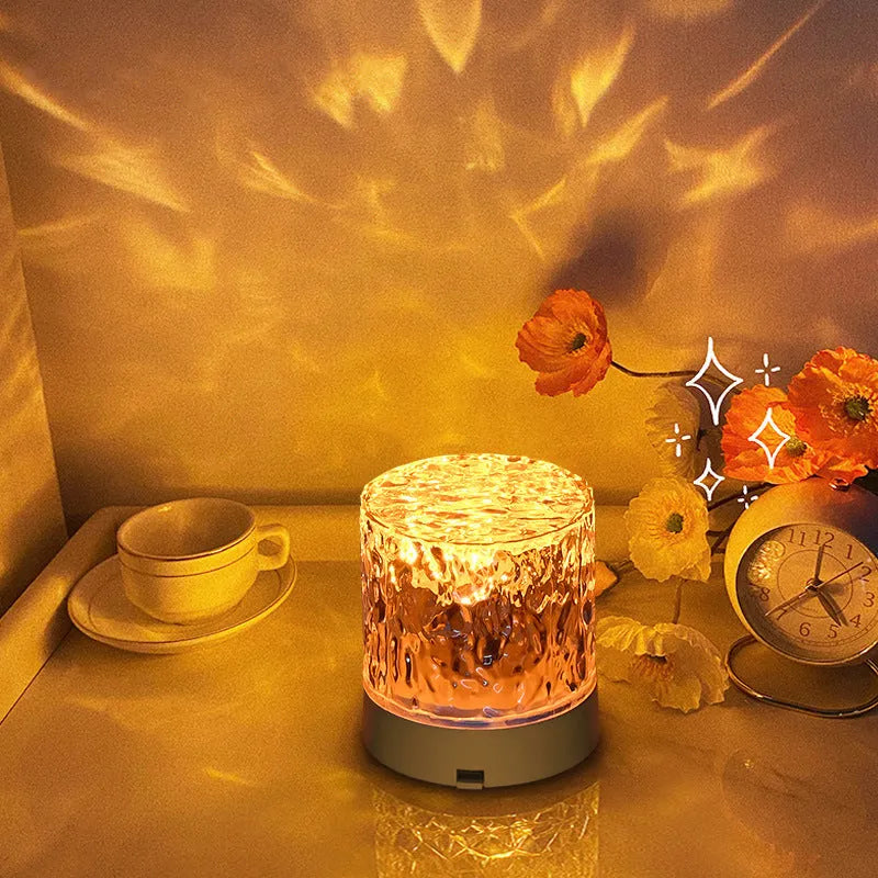 Crystal water ripple projector night light with acrylic lampshade, USB charging and touch control on a table