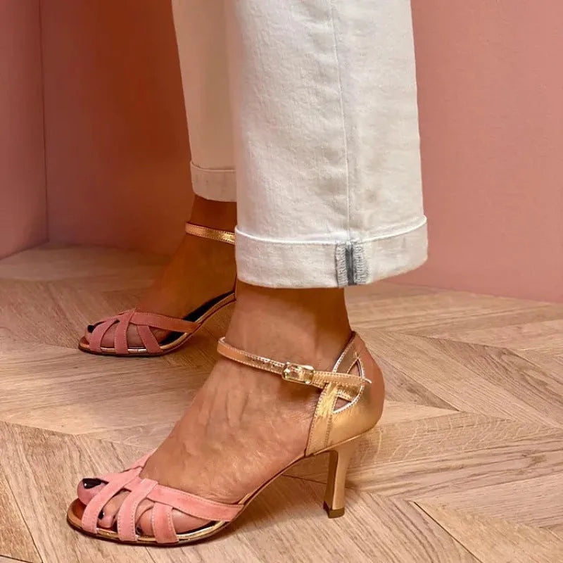 Adult unisex peep toe sandals with buckle closure in black, green, pink, or purple on a rubber sole.