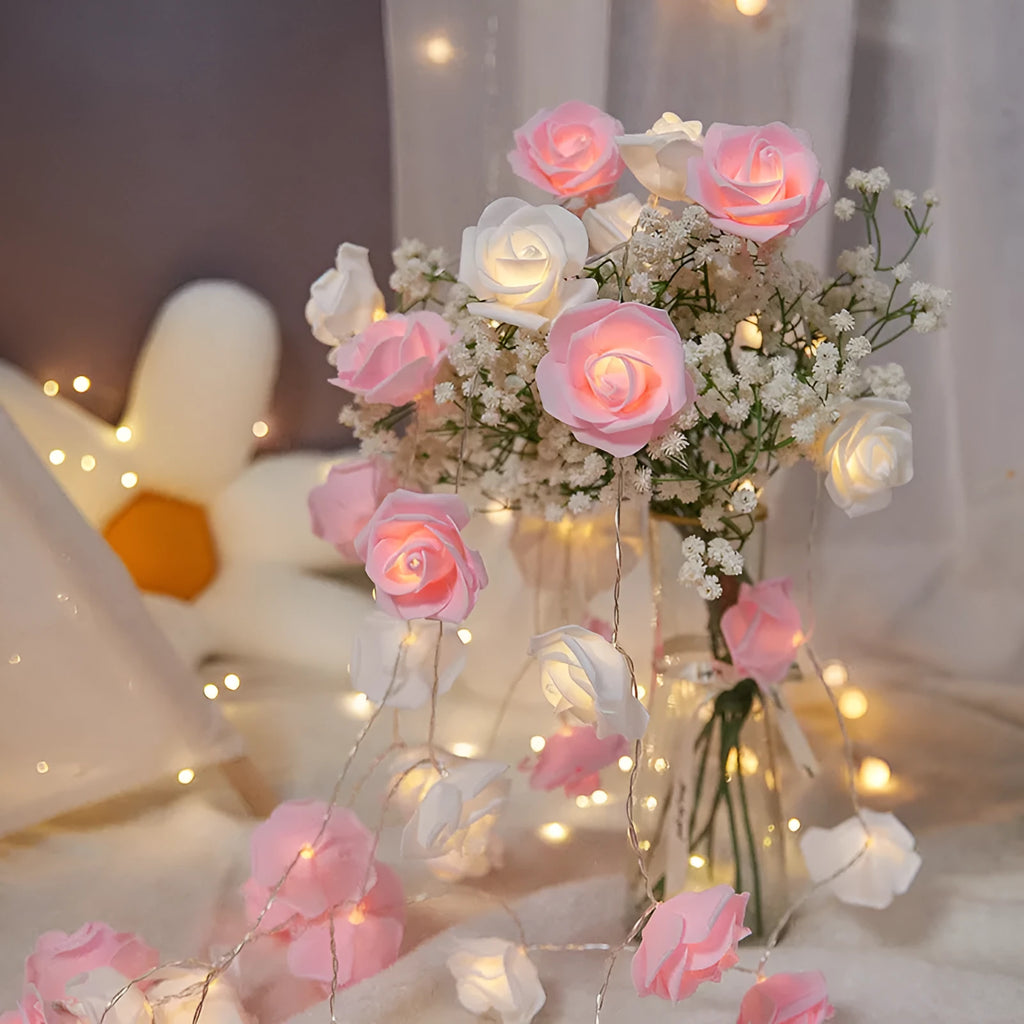 LED rose fairy light string with battery pack for indoor holiday decoration.