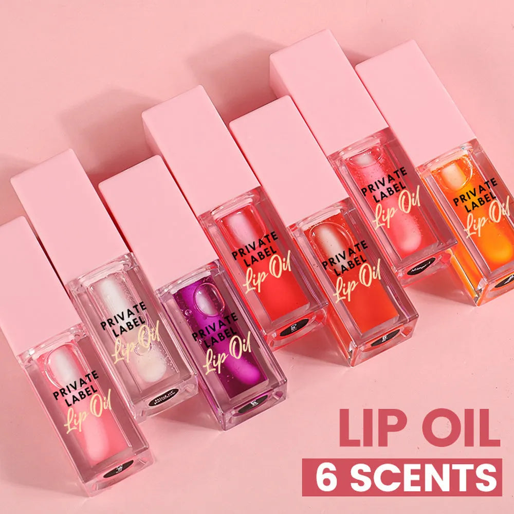Women's transparent lip gloss tube in six fruity flavours: Bird of Paradise, Cherry, Coral, Mango, Strawberry, Watermelon