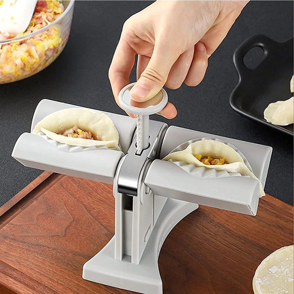White double-head manual dumpling press with stainless steel mould and plastic handles