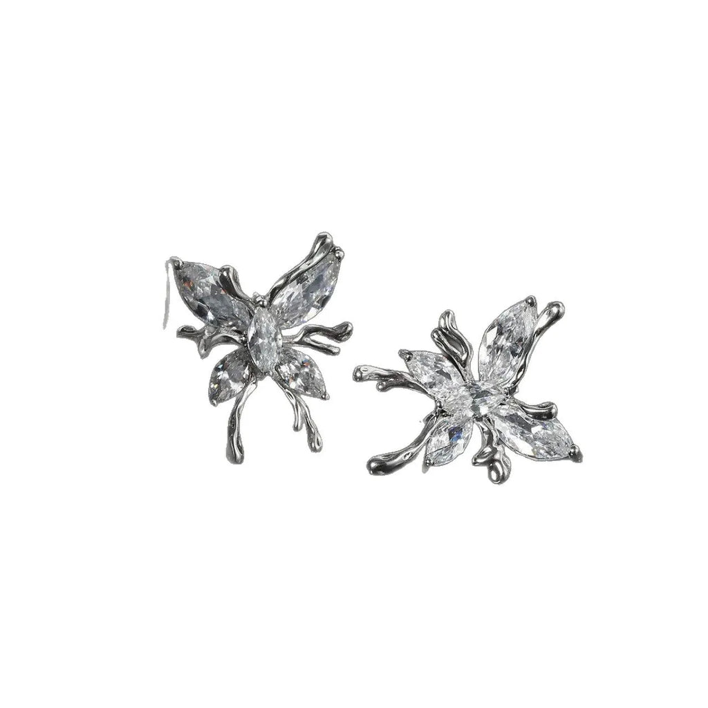 Pair of copper butterfly earphone clips with diamond inlay in a small fragrance style.