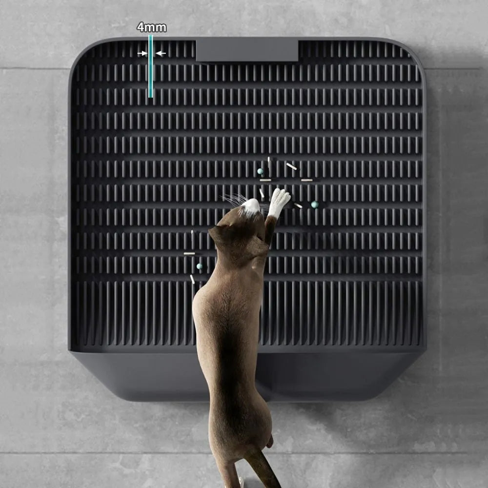 Large black cat litter pedal with slanted mouth design and textured surface for litter containment