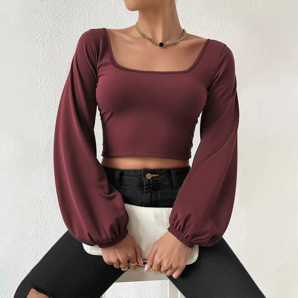 Wine red long-sleeved slim fit shirt with retro lantern sleeves and collage patchwork detail on polyester fabric