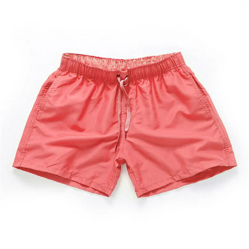 Men's straight leg beach shorts in multiple colours including fluorescent yellow for surfing