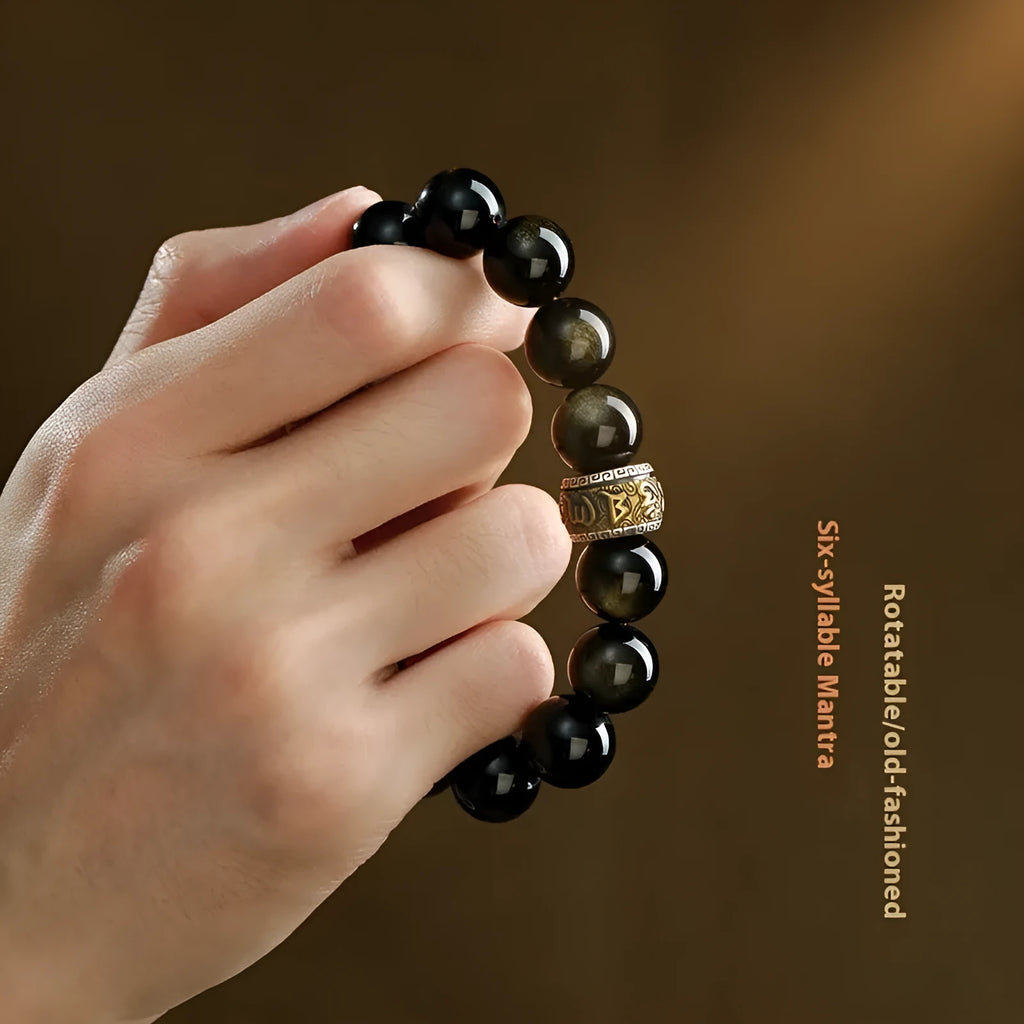 Carved cinnabar bead bracelet with animal zodiac designs in gold or silver colour