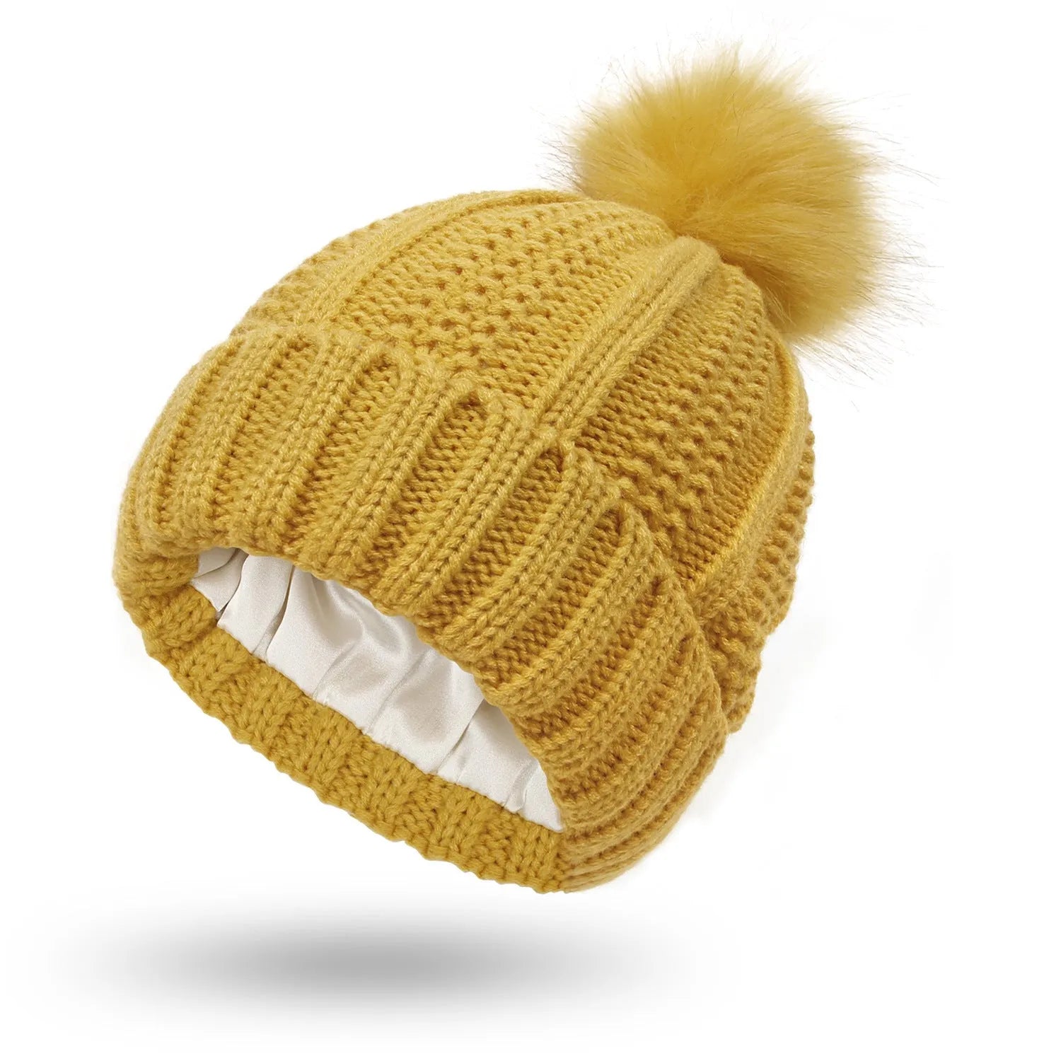 Women's satin-lined skull beanie hat with a faux fur pom pom in wine red colour.