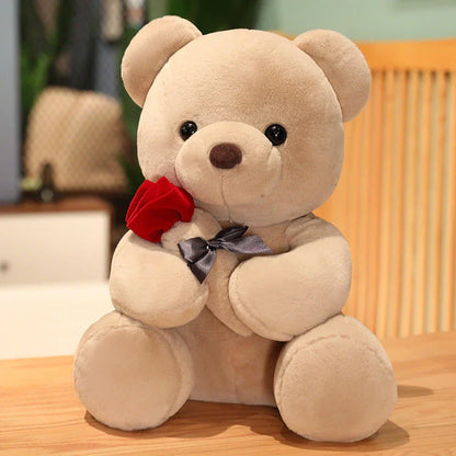 Plush teddy bear pillow with rose design, available in brown, beige, and grey colors in three sizes