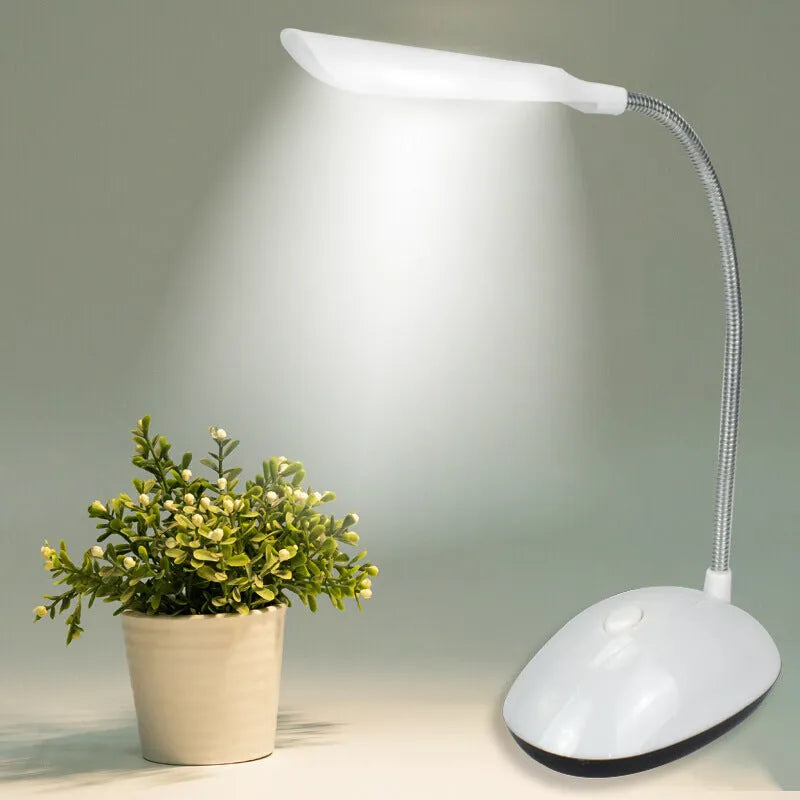 Battery LED desk lamp in white blue pink or green with three No7 batteries equipped for dormitory reading and study.