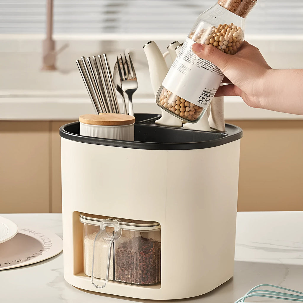 Rotating kitchen storage organiser with four compartments for cutlery and spices