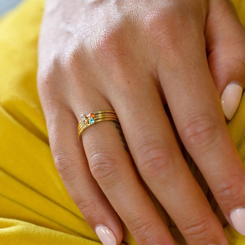 December birthstone titanium steel ring with gold electroplate and engraved geometry design.
