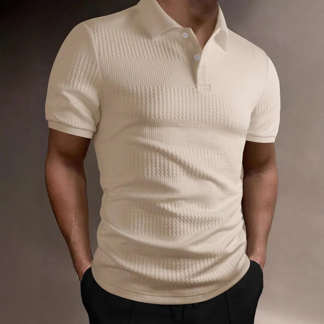 Man wearing a striped loose-fit polo shirt with an asymmetric design in light blue.