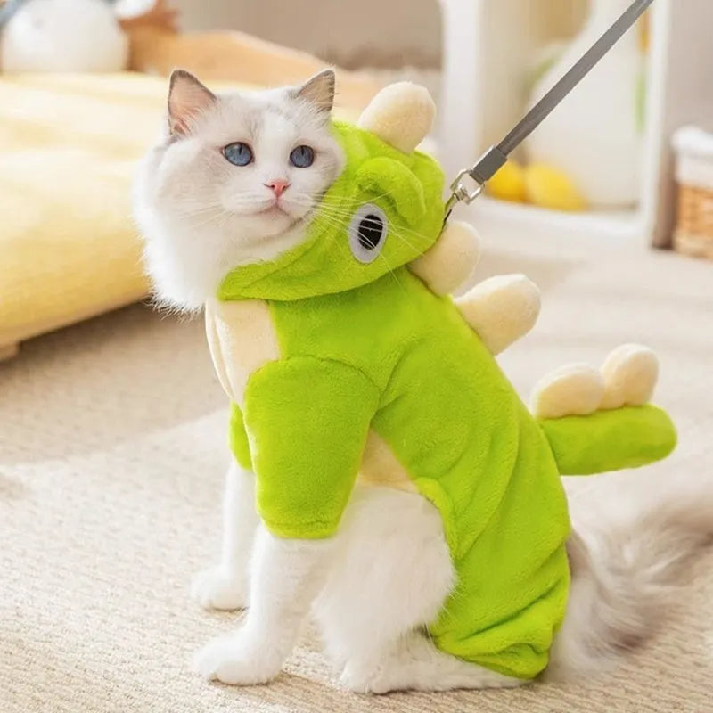 Green fleece dinosaur costume for small dogs with four legs, white chameleon back, and cartoon eyes