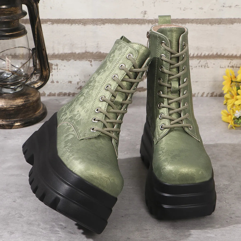 Women's white retro platform Martin boots with patchwork toe and side zipper on a chunky heel.