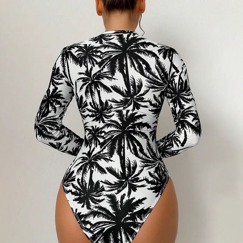 Women's one-piece printed swimsuit in blue with polyester and spandex lining, sizes S to XL.