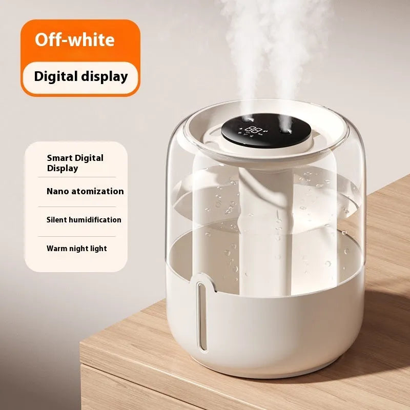 Beige round USB humidifier with dual spray nozzles, digital display, and night light on a table