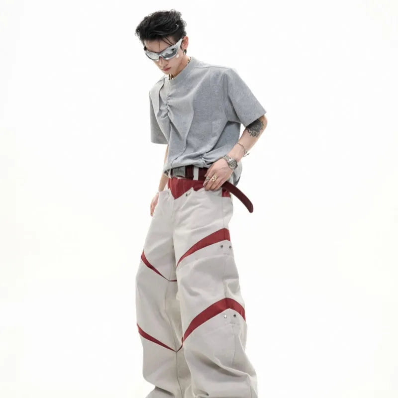 Men's loose fit cotton t-shirt with round neck collar and asymmetrical stitching in black, grey, or white