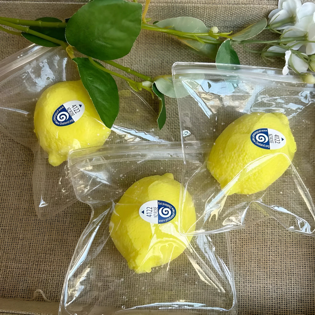 Bright yellow silicone lemon squeezing toy for stress relief and hand training