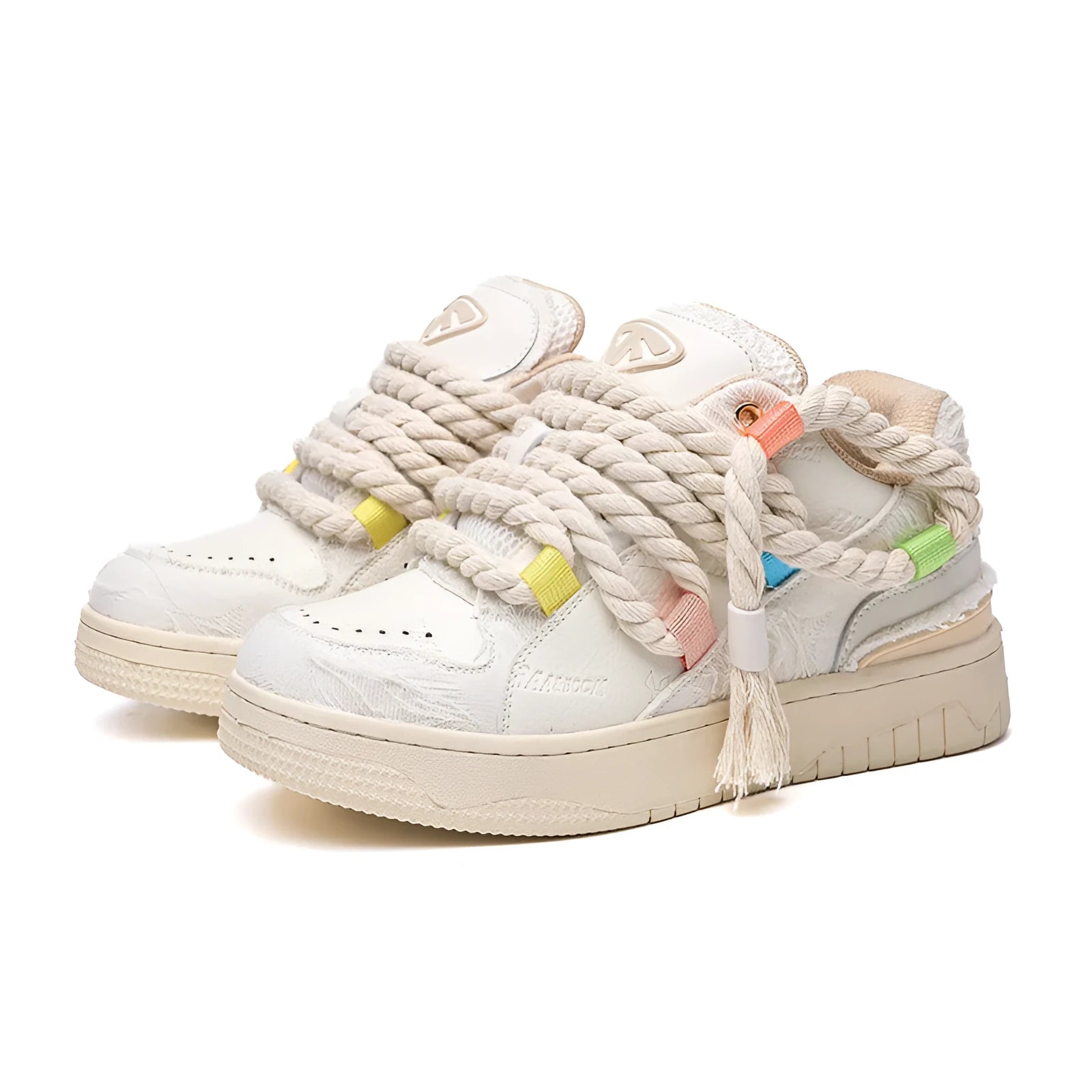 Creamy white low-top retro skateboard shoes with lace-up front and platform sole.
