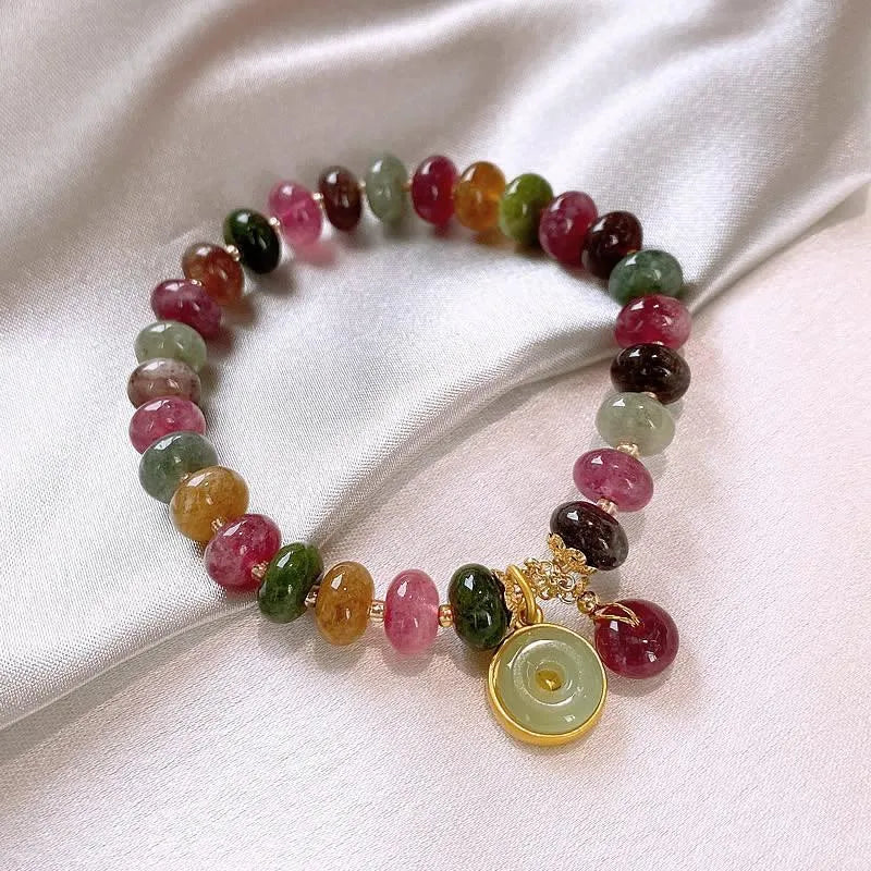 Handmade natural stone bracelet with colourful tourmaline rabbit pendant and geometric round beads
