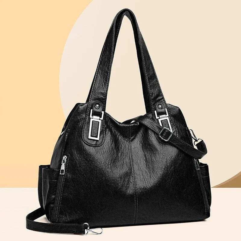Square vertical women's tote bag in soft PU material with a single shoulder strap, shown in a light brown colour.