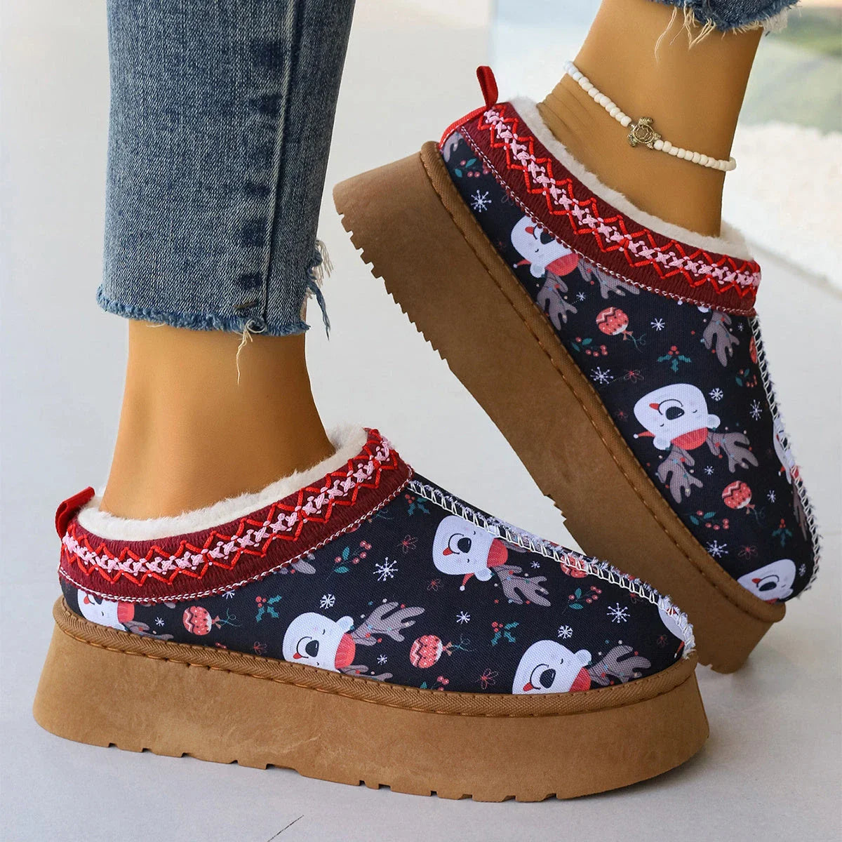 Cozy women's Christmas ankle boots with plush lining and slip-on design in festive snowman, bear, red, and Santa Claus designs