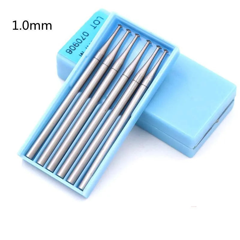 Blue box containing six thin disc needle tungsten steel carving cutters on 2.35mm mandrels, sizes 1.0mm to 2.0mm.