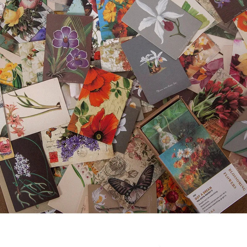 100 retro double-sided mini notes cards in seven vintage colours including antique paper and blossoming flowers designs