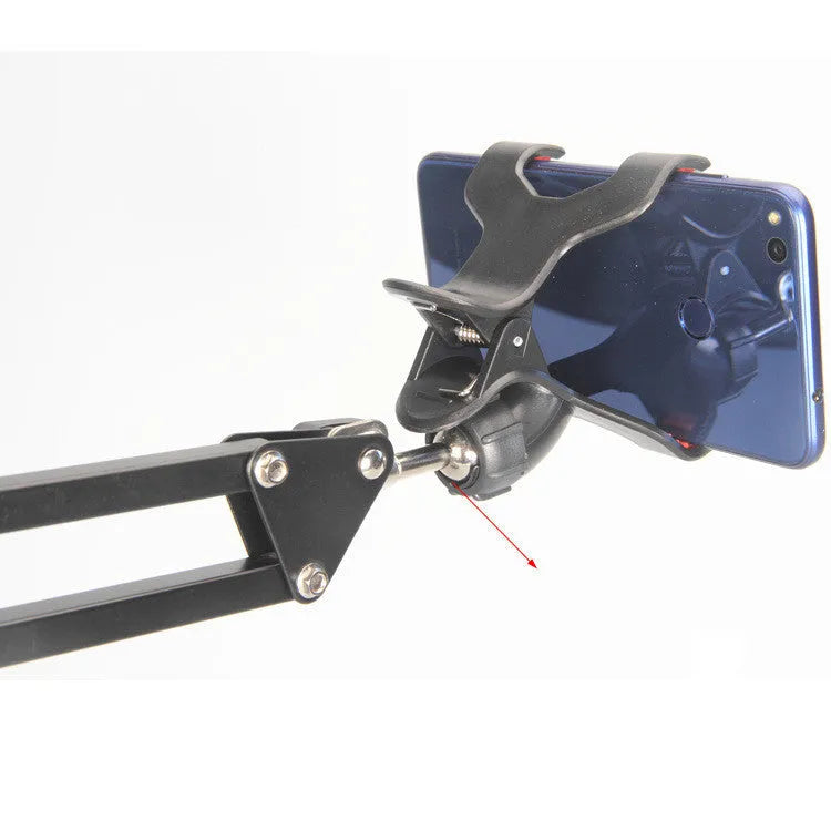 Black universal phone stand with long metal arm and heavy round base holding a mobile phone