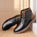 Men's brown ankle boot with a side zip fastening and round toe on a rubber sole.