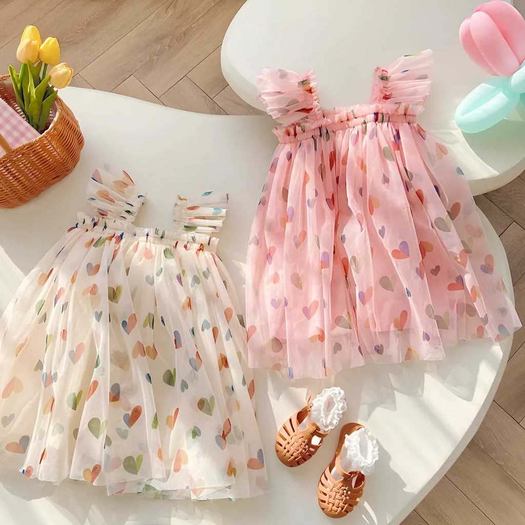 Girls summer dress with heart print mesh outer and cotton lining, pink or apricot, sizes 80cm to 130cm