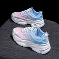 Women's pink satin lace-up casual shoes with round toe on a white background.