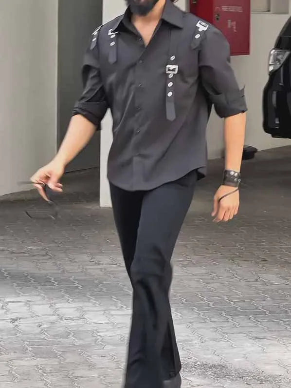 Black men's button-up shirt with regular fit on mannequin showing front button closure