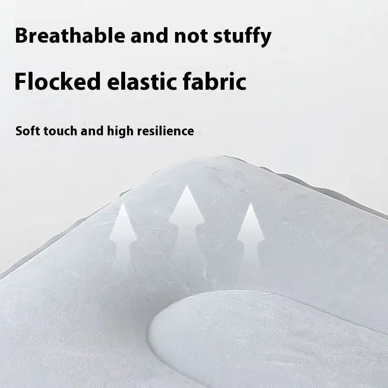 Press inflatable flocked seat cushion shown deflated and folded next to a chair.
