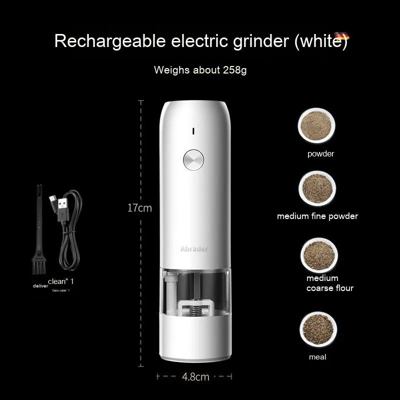 Black and silver rechargeable electric pepper grinder with clear acrylic body on a kitchen counter