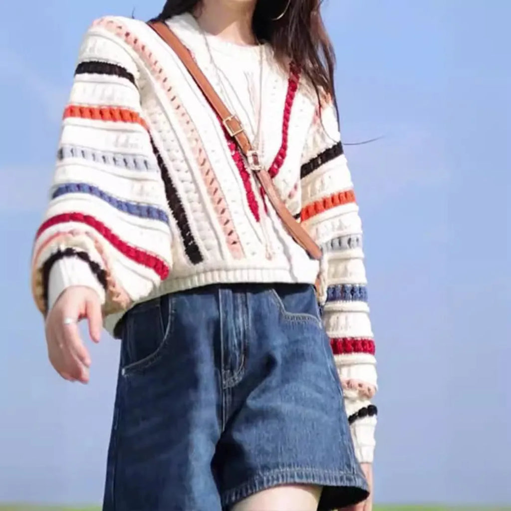 Colourful rainbow striped hollow knit sweater with batwing sleeves and round neck