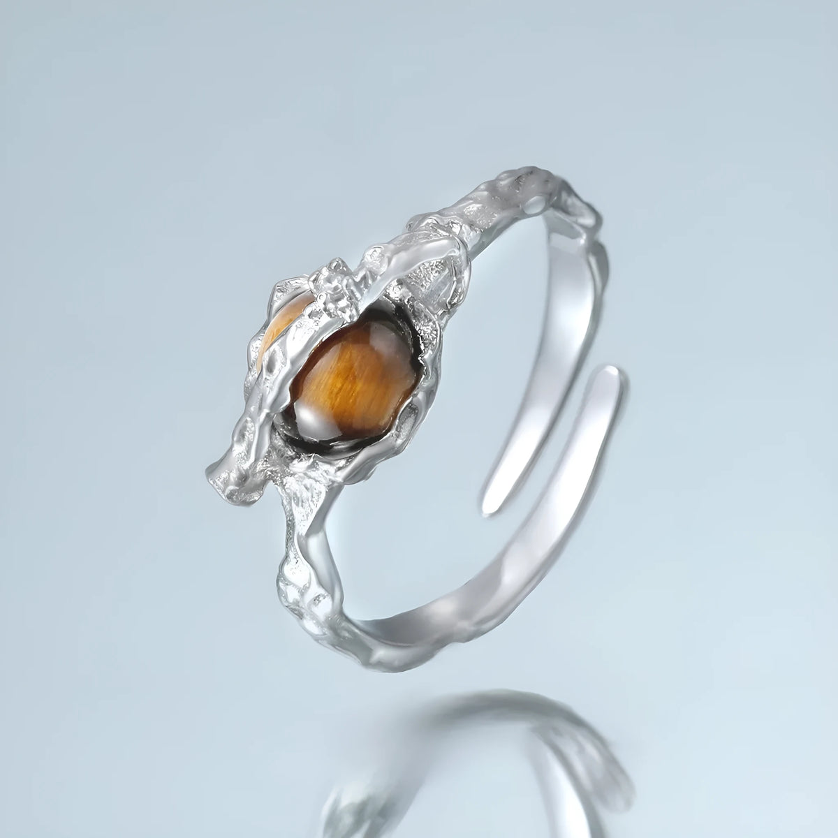 Adjustable Saturn open ring for women with white gold electroplated finish on silver