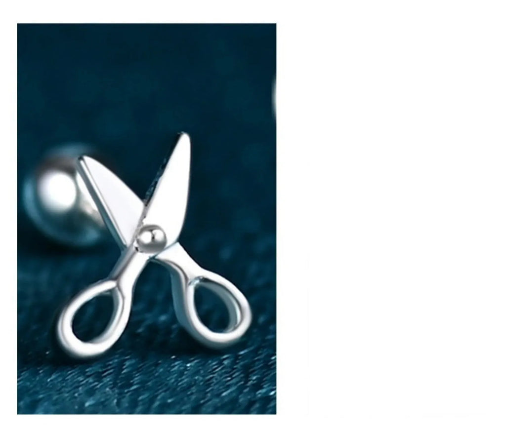 A pair of S999 pure silver ear nail earrings with a mini scissors and screws design.