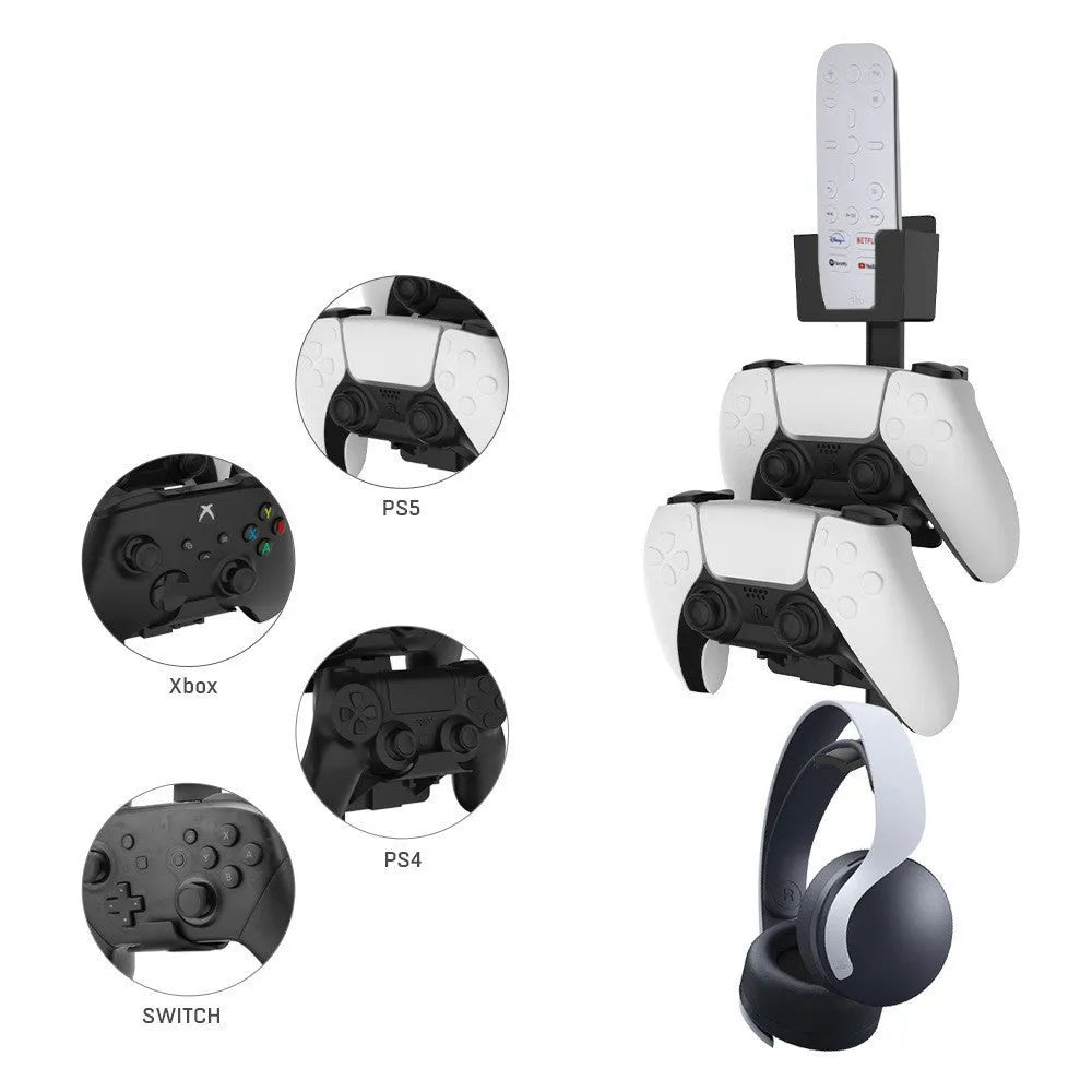 White wall-mounted hook holding a PS5 controller and gaming headset.