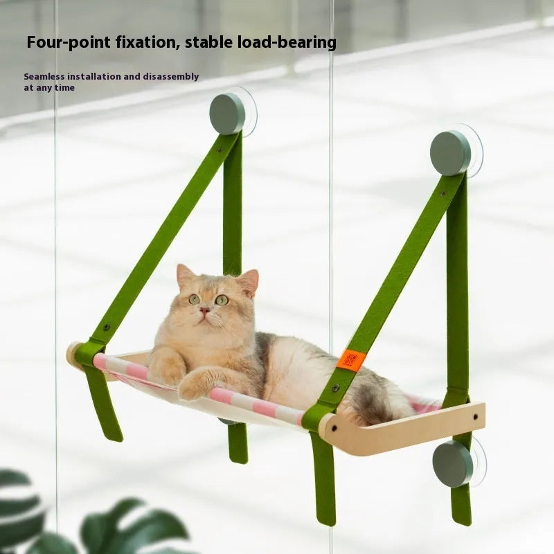 Cat hammock window sucker on glass balcony with metal frame in modern simplicity style