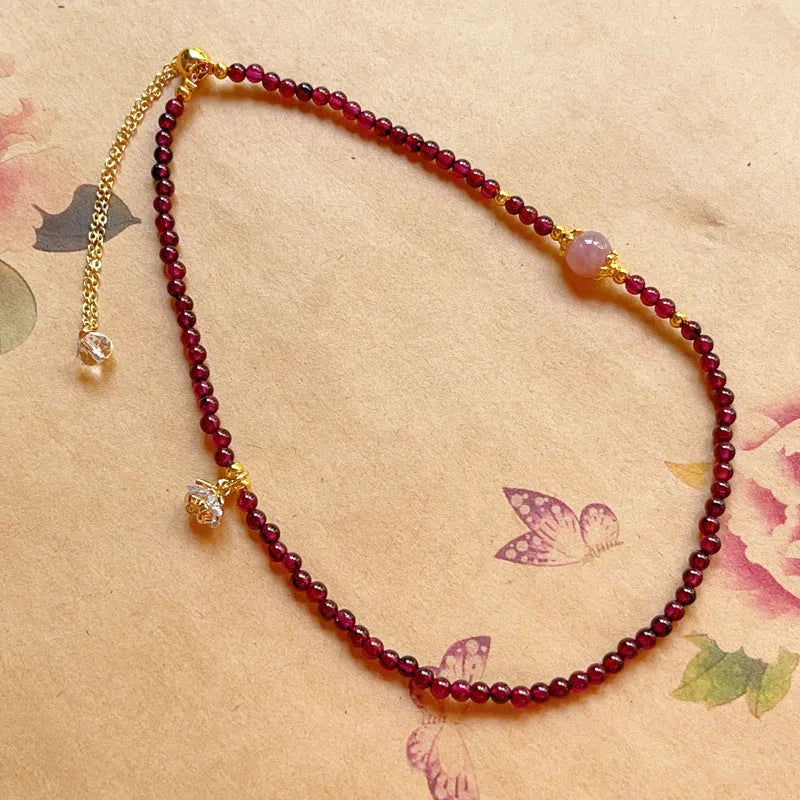 Women's natural garnet bracelet with double ring design in H311 colour, handcrafted using manual processing techniques