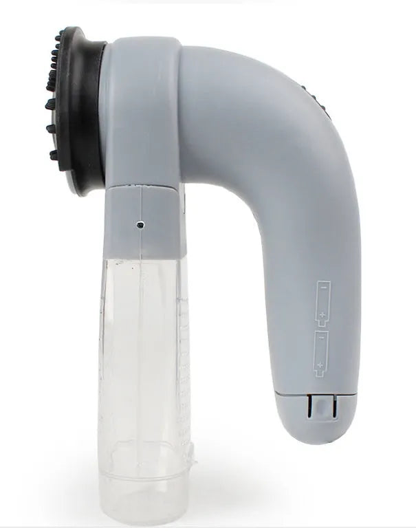 Grey electric pet hair vacuum grooming brush with rubber head and collection canister