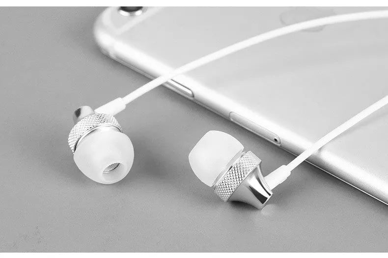 Metal in-ear headphones with wheat-coloured cable and 3.5mm plug in gold, silver, black, and red/black colours.