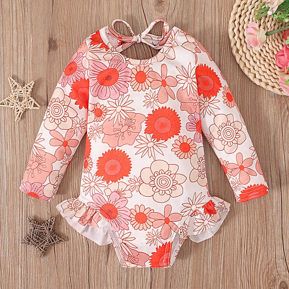 Girl's floral print open back swimsuit in orange red with crew neckline and Asian-fit sizing