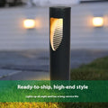 Black geometric solar-powered lawn light for outdoor garden use.