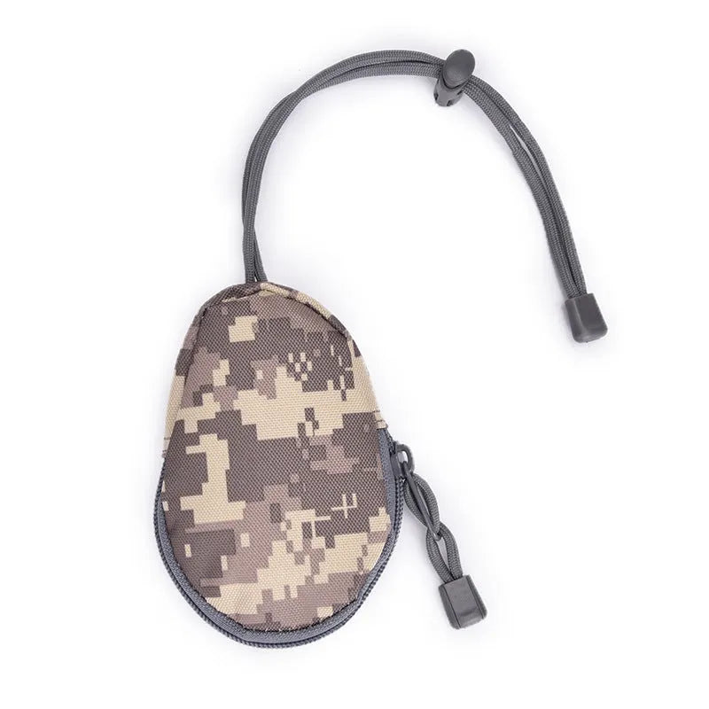 Black Oxford cloth outdoor key bag with zipper, shown next to a telescopic rope.