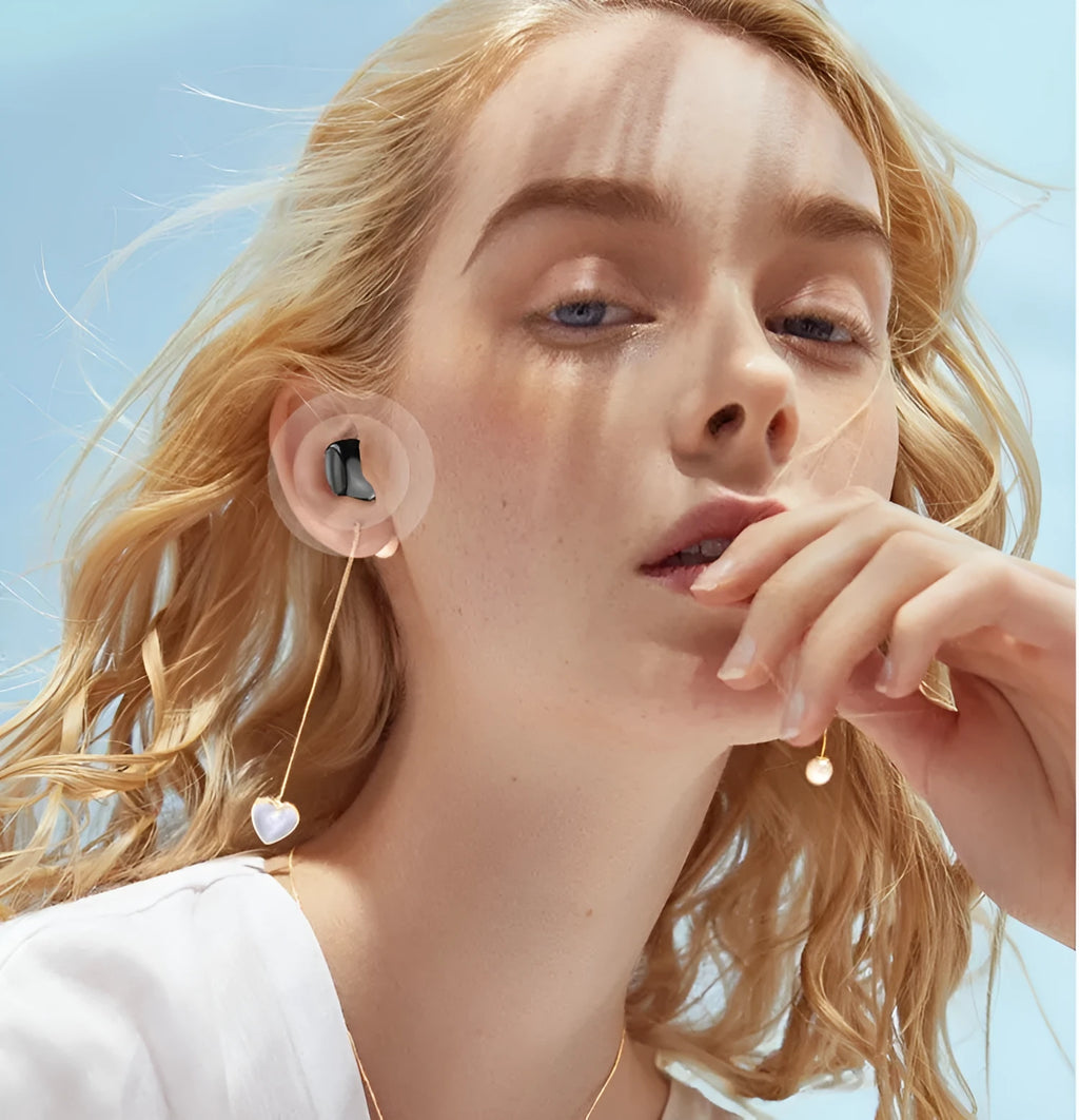Mini wireless Bluetooth sports in-ear headphones with 8mm copper ring speaker, black earplug style on white background