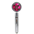 Round chrome and ABS plastic water-saving shower head with a 360-degree rotating nozzle.