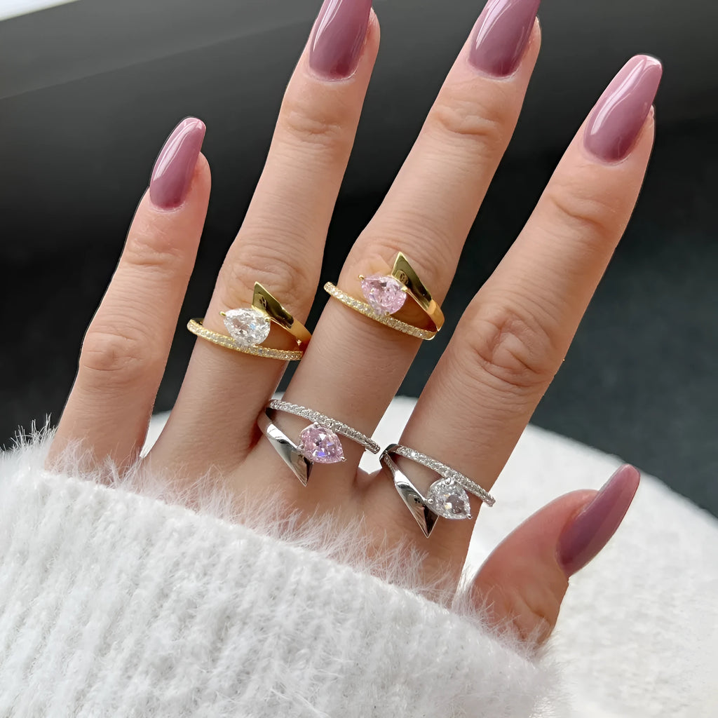 Women's silver water drop diamond ring with electroplated finish, geometric drop shape, golden pink diamond colour option